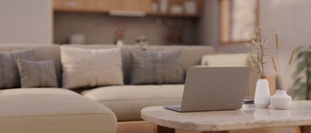 A laptop computer on a marble coffee table in a modern spacious living room. Home workspace concept. back view image. 3d render, 3d illustrationの写真素材