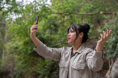 An uncertain and worried Asian woman got lost and could not find an internet connection on her phone...