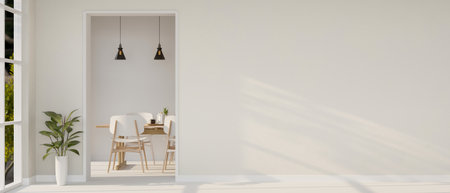 The interior design of a contemporary white home corridor through a dining room features a...