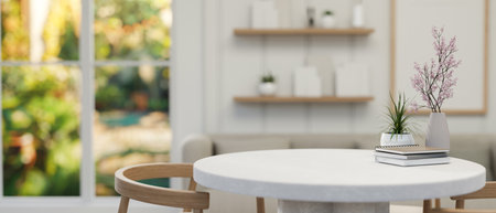 A space for displaying products on a white round table in a beautiful minimalist living room....