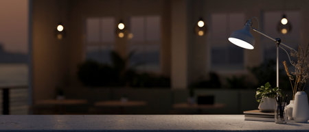 A space for displaying products on a table features decorative objects and a dim light from a lamp in a contemporary, dark coffee shop or restaurant at night. close-up image 3d render, 3d illustrationの写真素材