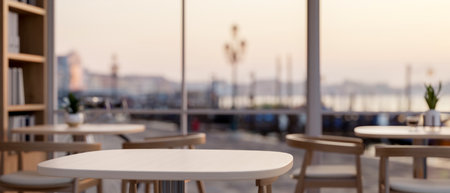 A close-up image of a showcasing space on a table in a comfortable, minimalist coffee shop or...