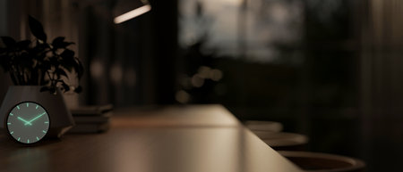 A close-up side view image of a neon alarm clock on a black table in a dark modern room at night. image with copy space, 3d render, 3d illustrationの写真素材