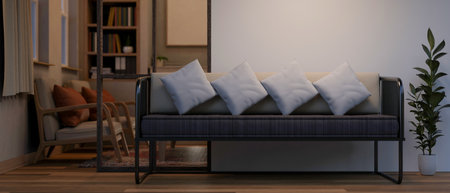 The interior design of a contemporary indoor corridor at night features a waiting sofa in front of...
