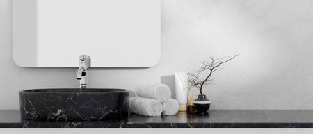 A close-up of a black marble bathroom vanity featuring a black marble basin with a silver faucet, towels, a black ceramic vase, and a mirror on the white wall. 3d render, 3d illustrationの写真素材