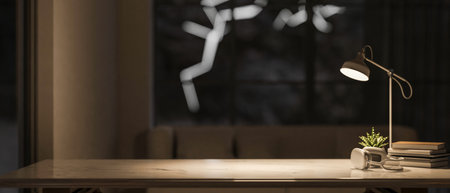 A close-up of a space for displaying product on a tabletop in a dark living room at night,...