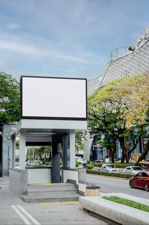 The blank screen or white screen outdoor advertising LED board on an entrance to subway station near shopping mall. Mockup for advertisement or design.の写真素材
