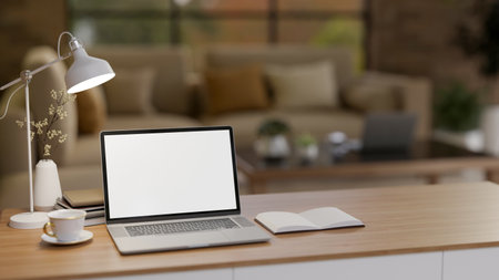 The blank screen laptop on wooden table in the earth tone living room or a lounge with brick wall. Advertising mockup, 3D Rendering, 3D Illustration.の写真素材