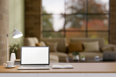 The white screen laptop on wooden table in the earth tone living room or a lounge with brick wall. Advertising mockup, 3D Rendering, 3D Illustration.の写真素材