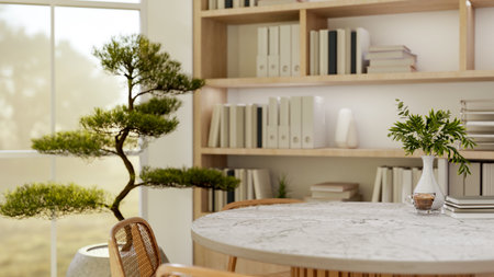 A cup of coffee and books on grey marble table with wooden chairs next to potted bonsai and bookshelf. Study or Working, 3d Rendering, 3d Illustration.の写真素材