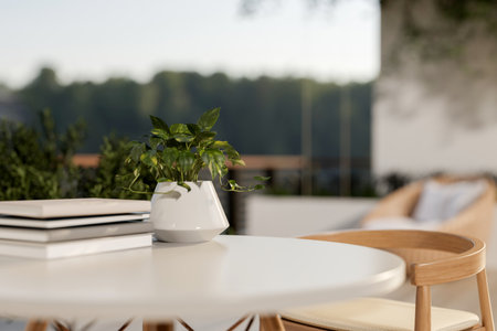 Books and potted plants on a white round table with armchair at the rooftop of a house or building. Working or Study, 3d Rendering, 3d Illustration.の写真素材