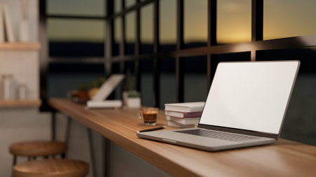 White screen laptop and coffee in glass cup with books aside on wooden table in cafe with evening sunset. Shop Interior, 3D rendering, 3D Illustration.の写真素材