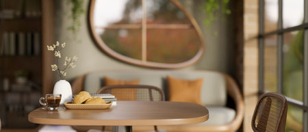 Breads on plate with glass cup of coffee aside books and vase on wooden stool table in lounge or...