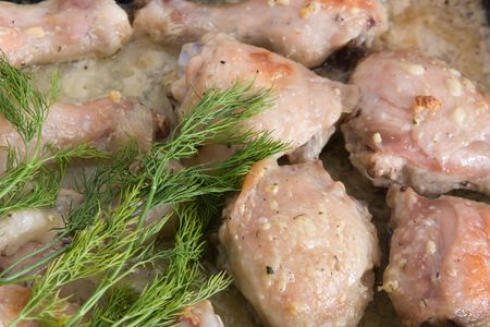 Chicken fast food with spices in roasting panの写真素材