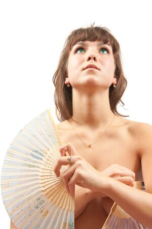 nudity girl with a fan on white. Isolatedの写真素材