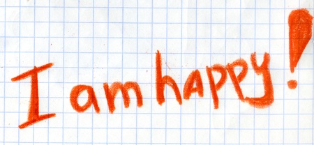 simple school drawing I AM HAPPY. on chequered paperの写真素材