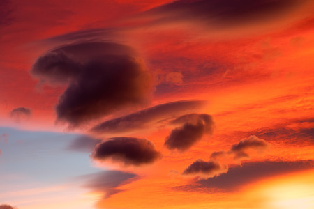 Sun and pink clouds in   dawn hour.