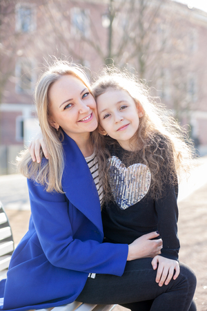 portrait of  mother with   daughter of 7 years old in 
spring  park.の写真素材