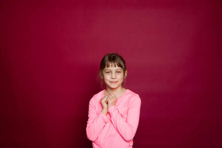 Portrait of eight years old, caucasian, happy blond child girl (kid) .Free text (copy) spaceの写真素材
