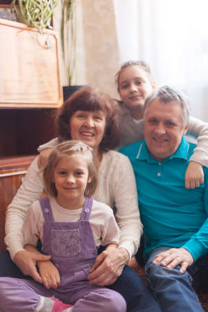 Granddaughters of 8 and 5 years old visiting their grandparents.の写真素材