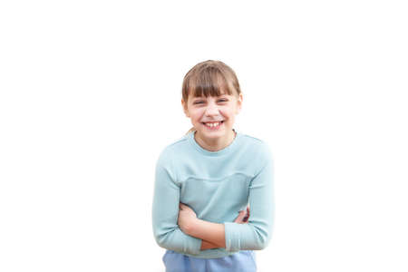 Studio shot of young preteen 9-10 year old blond girl , standing against white background