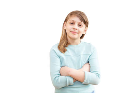 Close up portrait 9-10 year old girl isolated on white backgroundの写真素材