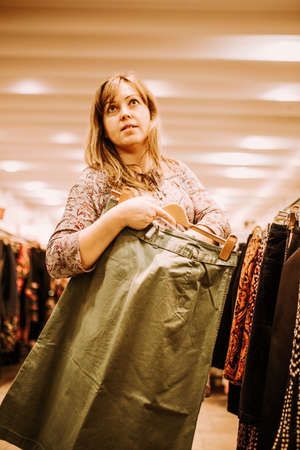 pregnant woman doing shopping early in the morningの写真素材