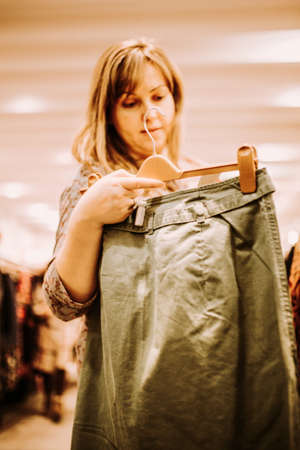 pregnant woman doing shopping early in the morningの写真素材