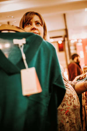 pregnant woman doing shopping early in the morningの写真素材