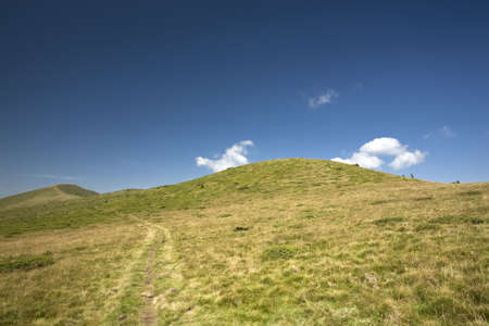Mountain landscape with deep blue sky. Location: Bulgaria, Balkan Mountains Range, peak Komの写真素材