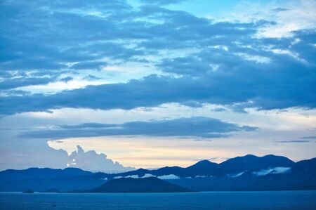 Blue mountains and clouds over the sea tourism travel Vietnamの写真素材