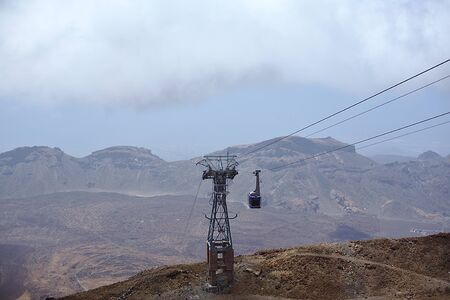 Lift high in the mountains, sunny day, tourist trip, the rise of the volcano, in the mountains.の写真素材