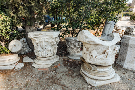 Close-up of ancient stone columns in a historic Turkish city. Intricate carvings and weathered textures reflect the architectural grandeur and rich history of the ancient civilization.の写真素材