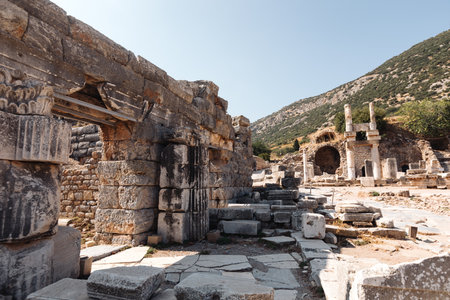 Close-up of ancient stone columns in a historic Turkish city. Intricate carvings and weathered textures reflect the architectural grandeur and rich history of the ancient civilization.の写真素材