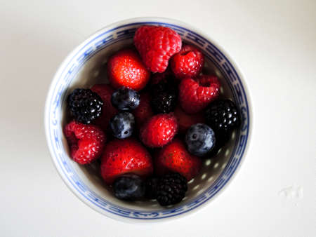 Fresh berries. Various summer berries in a bowlの写真素材