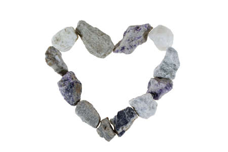 heart made of stones isolated on white backgroundの写真素材