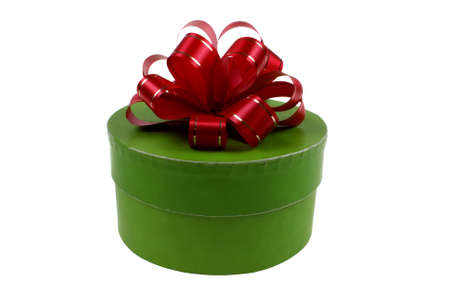 green package with red ribbon isolated on white backgroundの写真素材