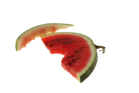 bitten slice of watermelon isolated on white backgroundの写真素材