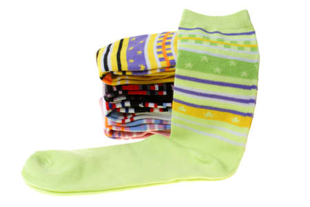 colourful pairs of socks isolated on white background