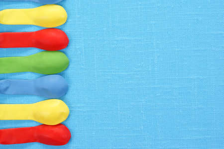 colourful empty balloons on blue backgroundの写真素材