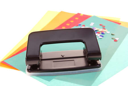 office puncher and paper isolated on white backgroundの写真素材