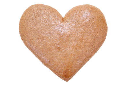 big gingerbread heart isolated on white backgroundの写真素材