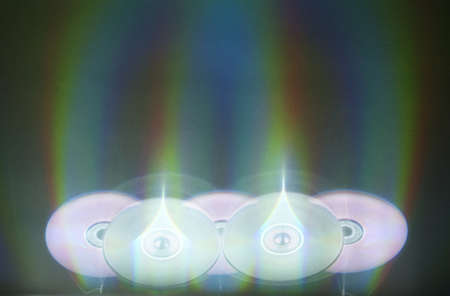 colourful reflex of light from CD as background