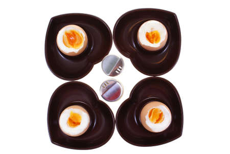 soft-boiled eggs and bread isolated on white backgroundの写真素材