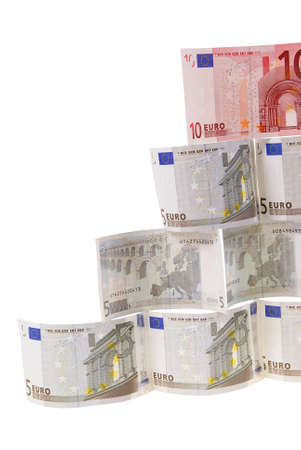 pyramid made of notes isolated on white backgroundの写真素材