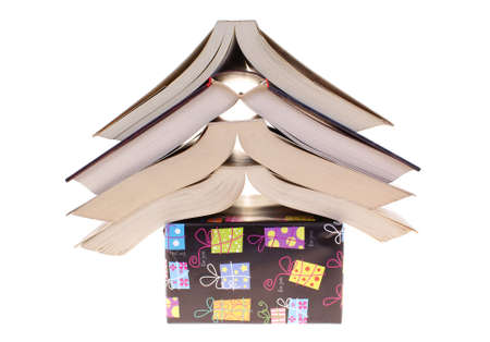 books arranged on colourful package  on white background 