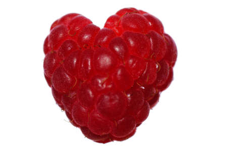 red raspberry in heart  form on white backgroundの写真素材