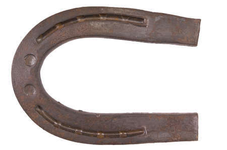 old rusty horseshoe isolated on white backgroundの写真素材