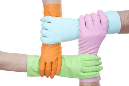 four colours of rubber gloves on white background