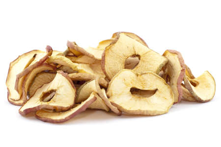 slices of dried apples on white backgroundの写真素材